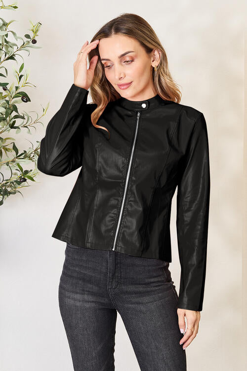 Chaqueta con cremallera y cuello simulado